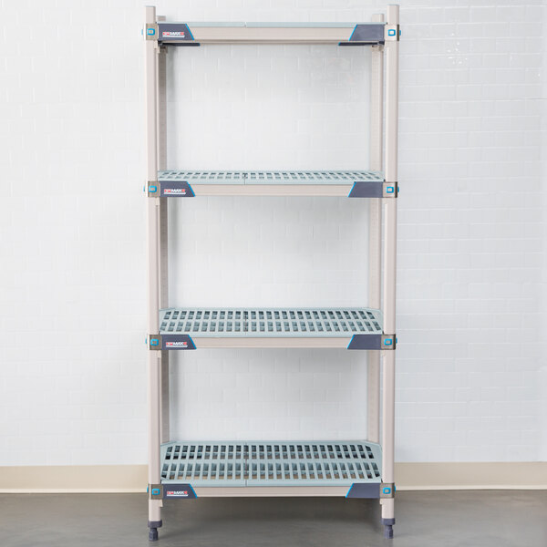 A white MetroMax metal shelf with removable grid mat.