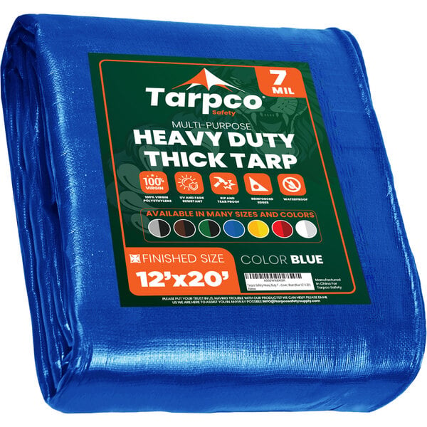 A blue Tarpco heavy-duty weatherproof tarp with green and white labels.