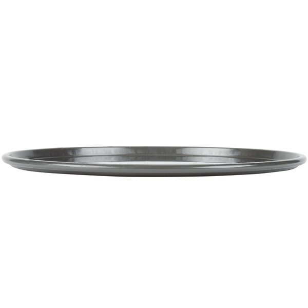 A black Chicago Metallic hard coat anodized aluminum pizza pan with a rim.