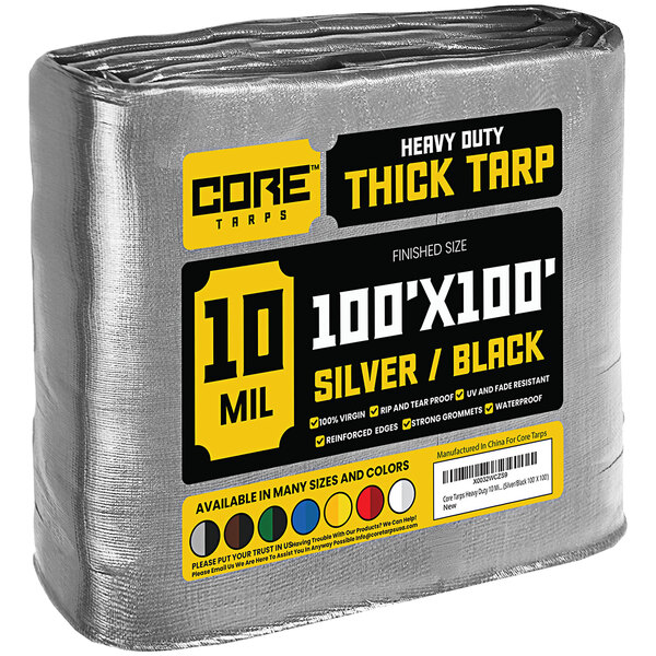 A roll of Core Heavy-Duty Weatherproof Poly Tarp with yellow and black text on the label.