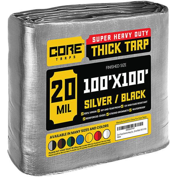 A large roll of Core silver and black heavy duty weatherproof poly tarp with a label.