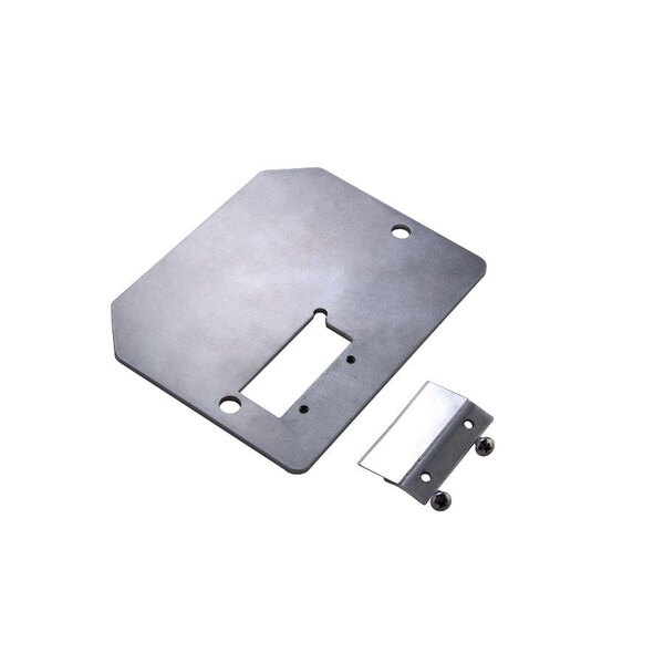 A metal chip twister face plate with holes.