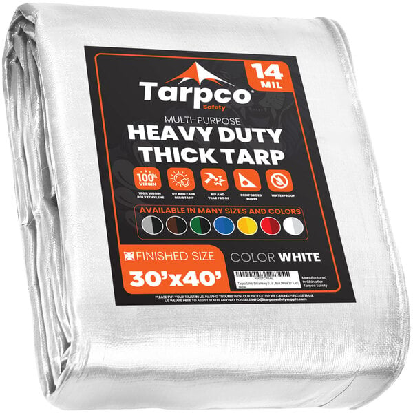 A white Tarpco tarp with black and orange text.