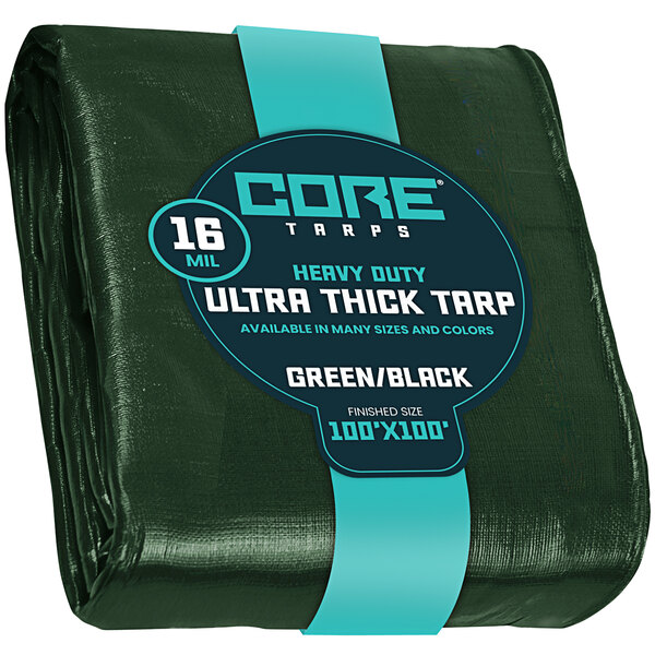 A green tarp with reinforced edges and a blue label.
