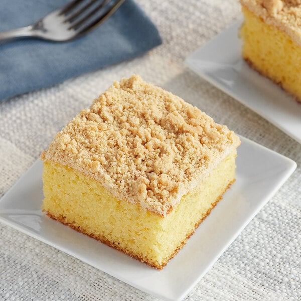 A piece of cake on a square plate with Rich's Streusel Crumb Topping.