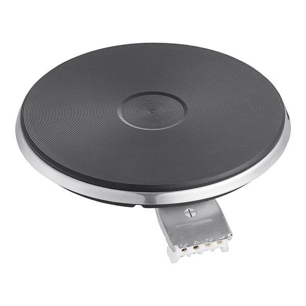 A black circular plate with a silver metal base.