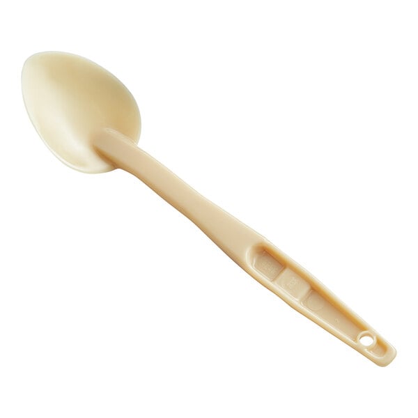 A beige plastic Cambro spoon with a handle.