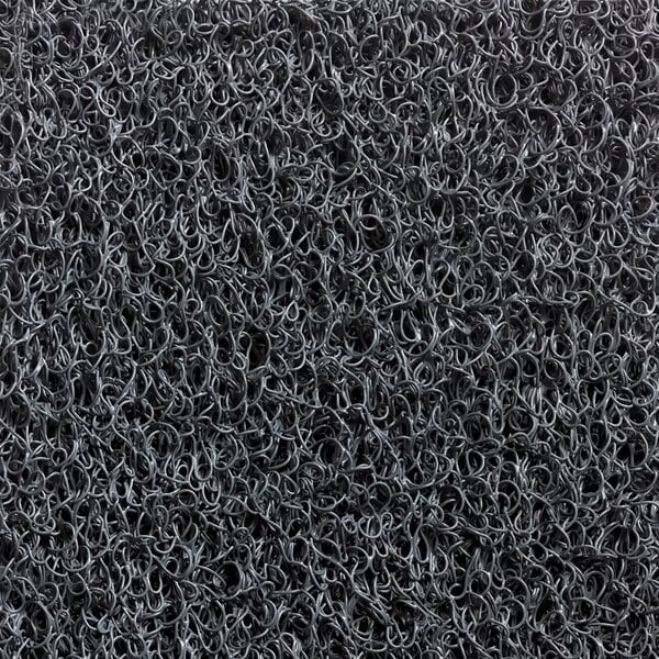 A close up of a grey unbacked scraper mat with black rings.