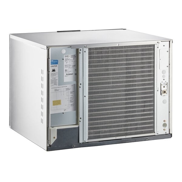 A white rectangular Scotsman air cooled ice machine with the door open.