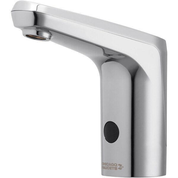 A silver Chicago Faucets touchless faucet with a black button.