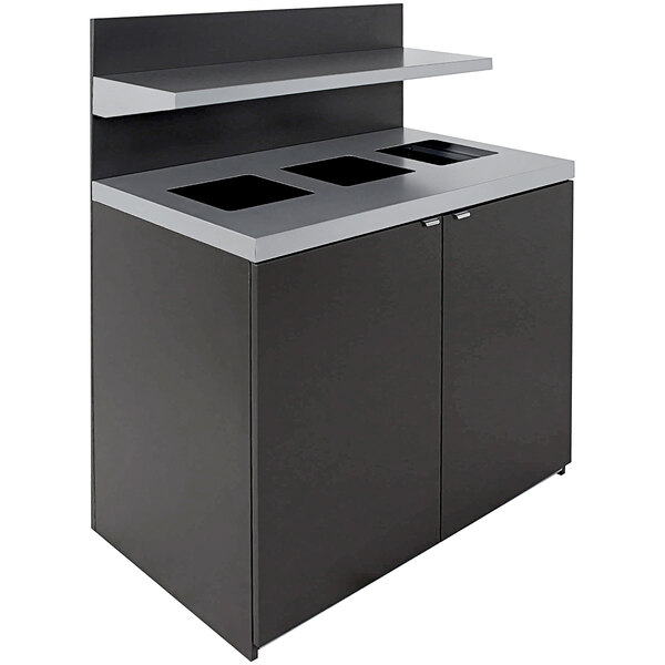 A black and grey rectangular Busch Systems composite three-stream receptacle with tray holder.