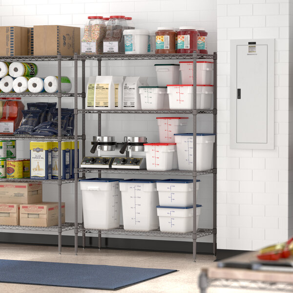 A Metro Super Erecta gray wire shelving unit with food items on it.