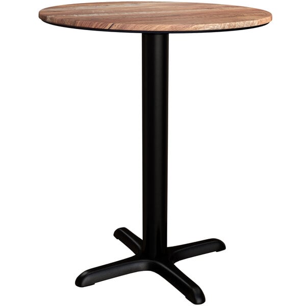 A round wooden Lancaster Table with a black base.