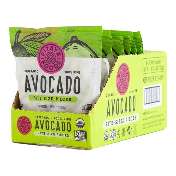 A green box with a package of Pitaya Foods IQF organic avocado pieces.