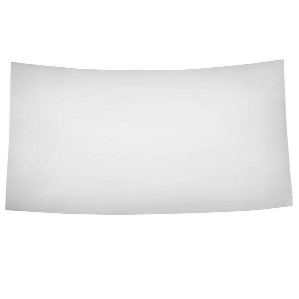 A white sheet of paper on a Vollrath stainless steel curved platter with a white background.