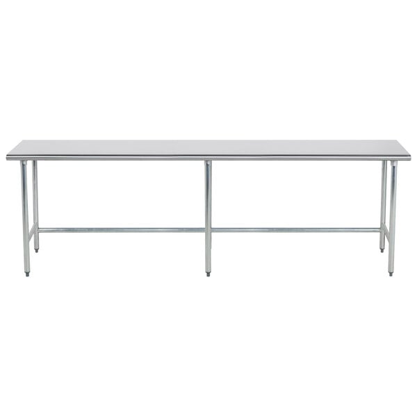 A long metal Advance Tabco stainless steel work table with an open base.