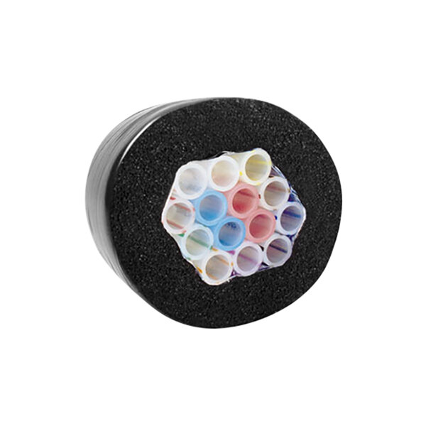 A black foam tube with colorful plastic and glycol tubes inside.