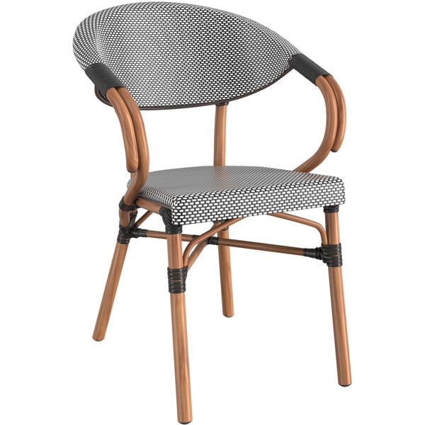 A black and white outdoor chair with wooden arms and legs.