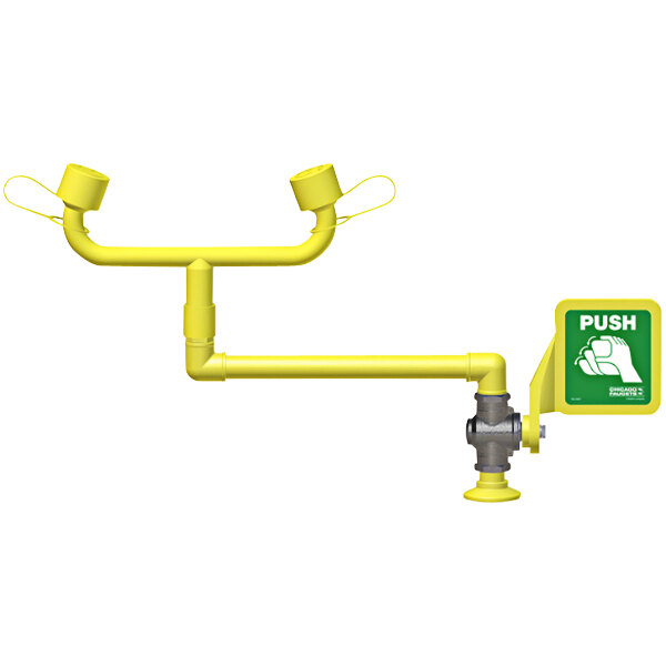 A yellow Chicago Faucets pipe with a green sign.