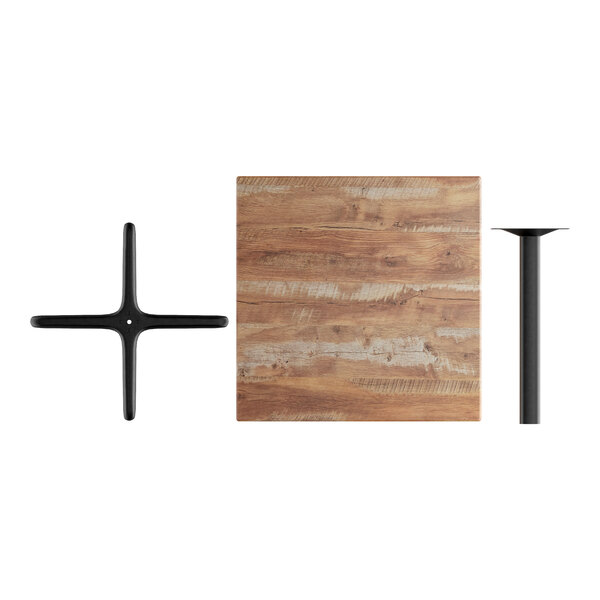 A Lancaster Table & Seating Yukon Oak square table with a metal cross-shaped base.