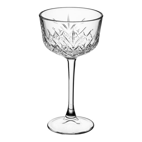 A Pasabahce Timeless Vintage Nick and Nora glass with a diamond cut design.