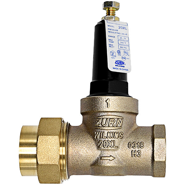 A close-up of a Zurn brass water pressure reducing valve with a black cap and gold handle.