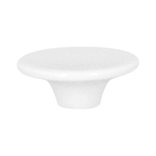 A small white porcelain trumpet stand with a wide, flat top and a narrow base.