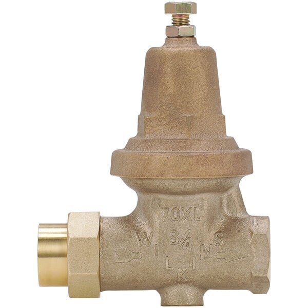 A Zurn brass water pressure reducing valve with a gold cap on white background.