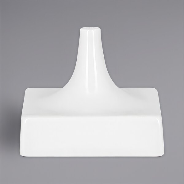 A white square RAK Porcelain stand with a hole in the top.