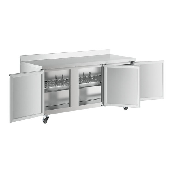 An Avantco stainless steel worktop refrigerator with doors open.