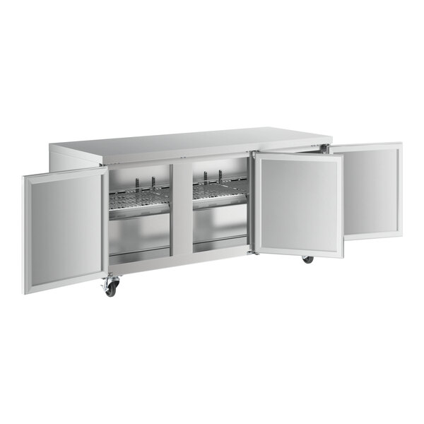 A silver Avantco undercounter refrigerator with open doors.