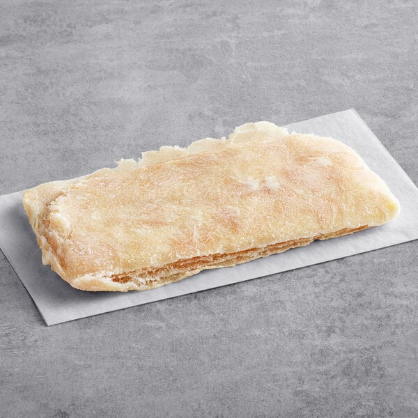 Original Philly Cheesesteak Co. marinated chicken sandwich steak on a white surface.