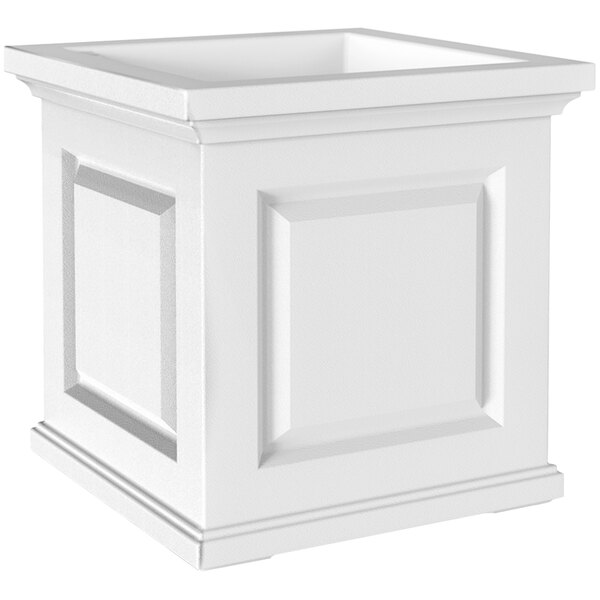 A white square planter box with square corners.