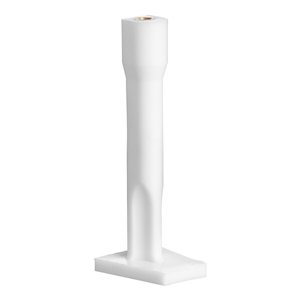 A white plastic cylinder with a hole in the middle.