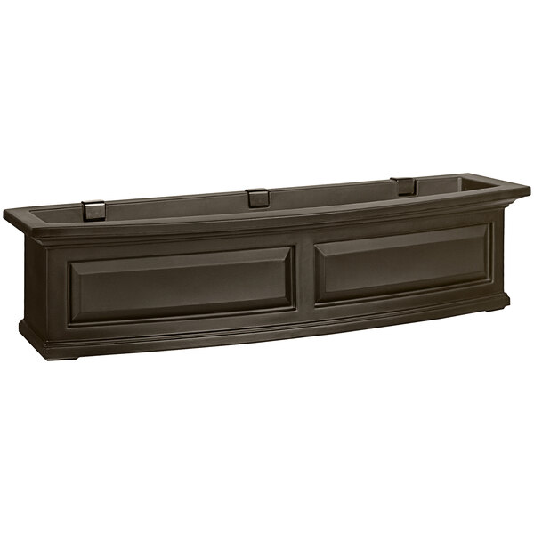 A black rectangular Mayne window box on a counter.