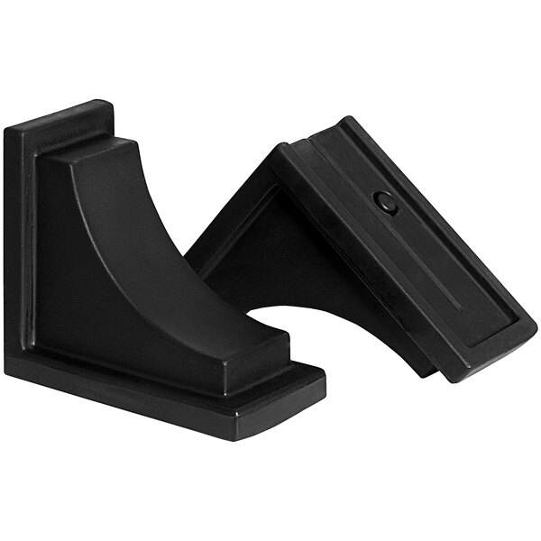 Two black plastic Mayne Nantucket corbels.