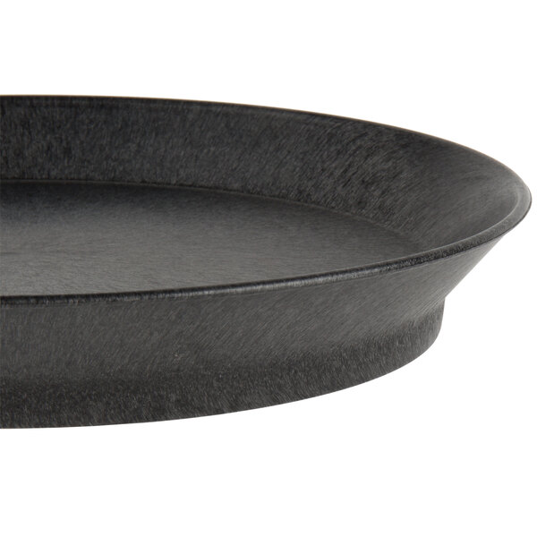 A black oval deli server with a short base.