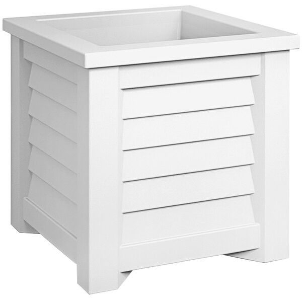 A white square planter with slats on top.