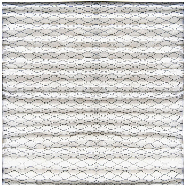 A close-up of a white and gray pleated media filter.