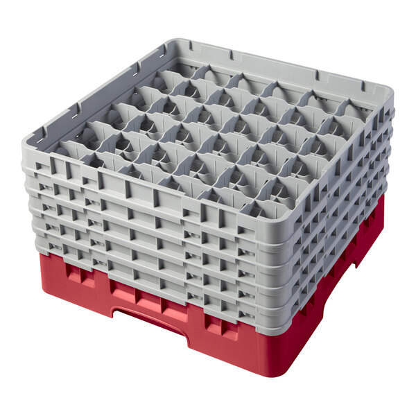 A red and gray plastic Cambro glass rack with extenders.