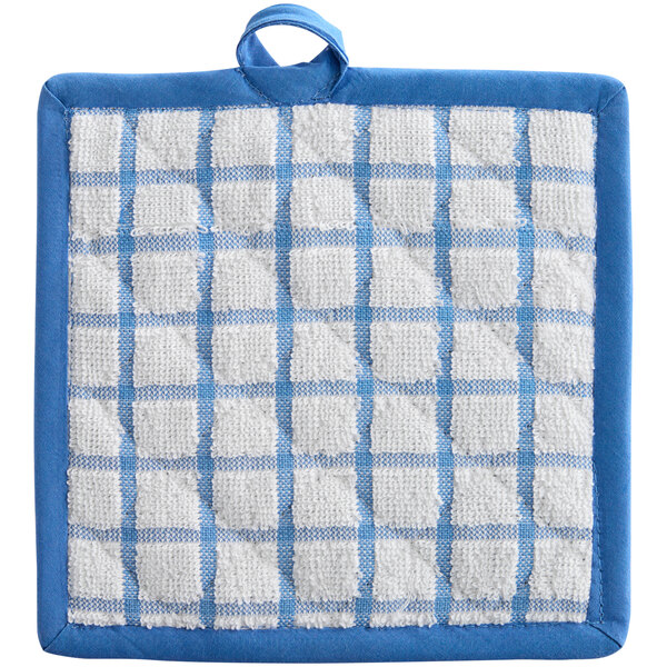 A white pot holder with blue windowpane plaid.