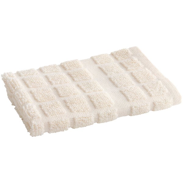 A beige Oxford Kitchen dish towel with a square pattern.