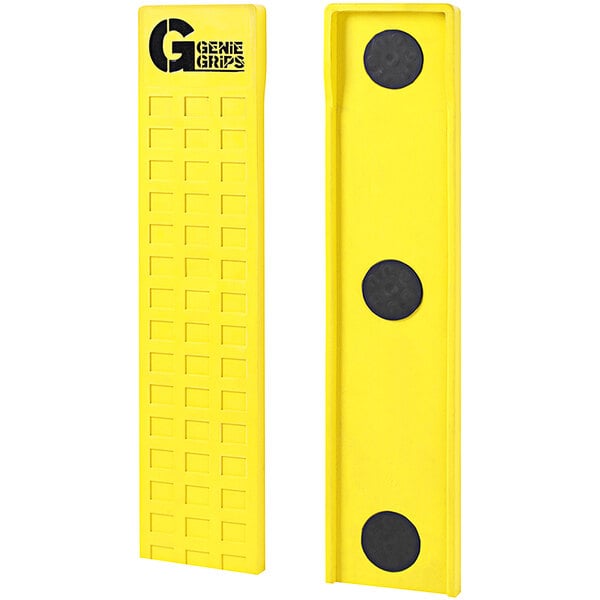 Two yellow rectangular magnetic cushions with black circles on them.