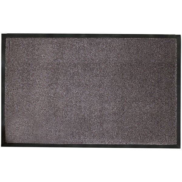 A brown rectangular entrance mat with black trim.