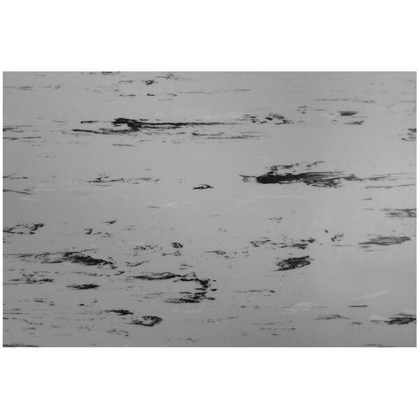 A white surface with black lines.