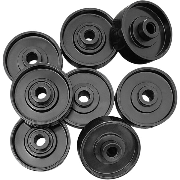 A group of six black Lavex plastic conveyor skate wheels.