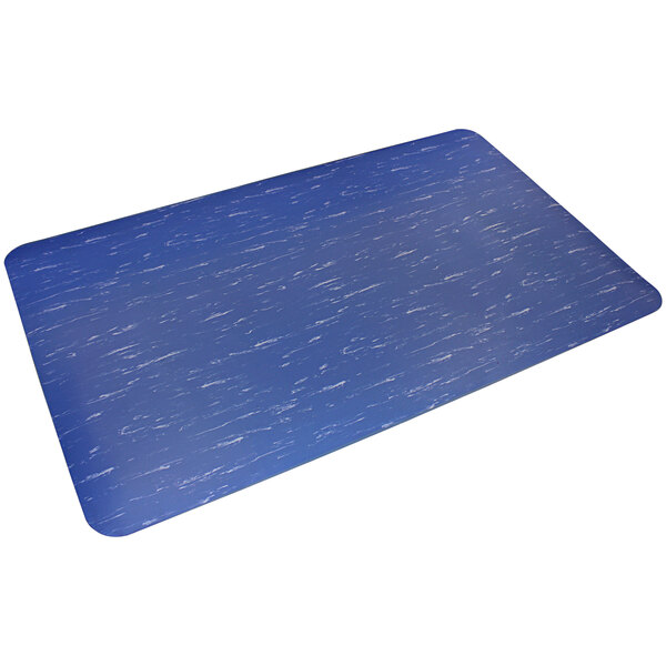 A blue rectangular mat with a speckled surface.