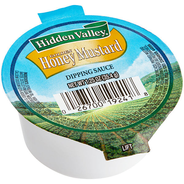 A container of Hidden Valley Golden Honey Mustard Dressing.