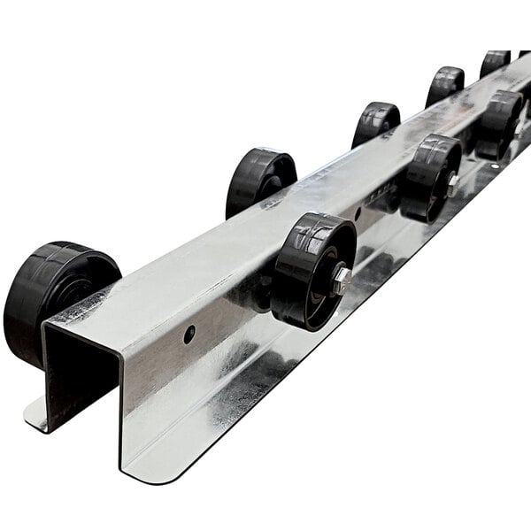 A metal bar with staggered black wheels on it.