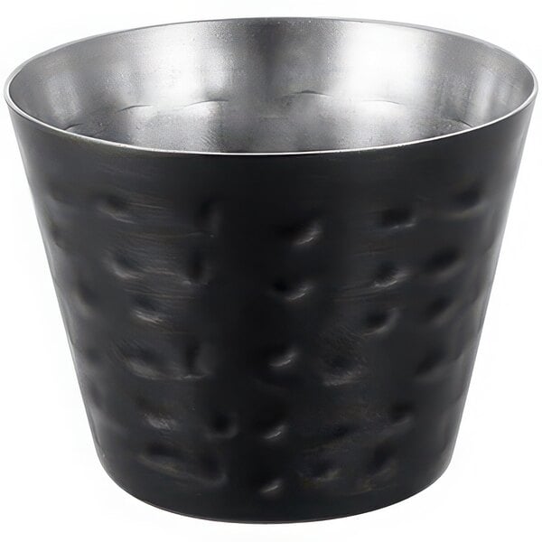 A black stainless steel sauce cup with a hammered texture and a silver rim.